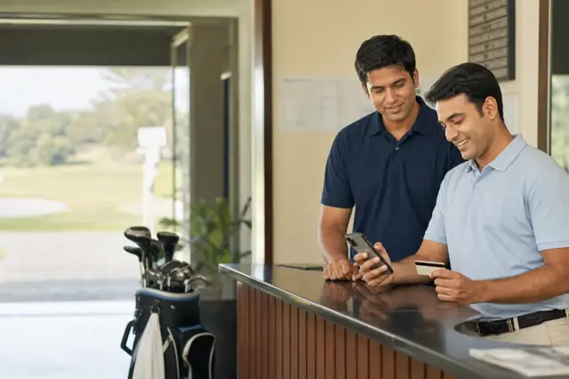Indian consumer reviewing golf credit card features and monthly spending