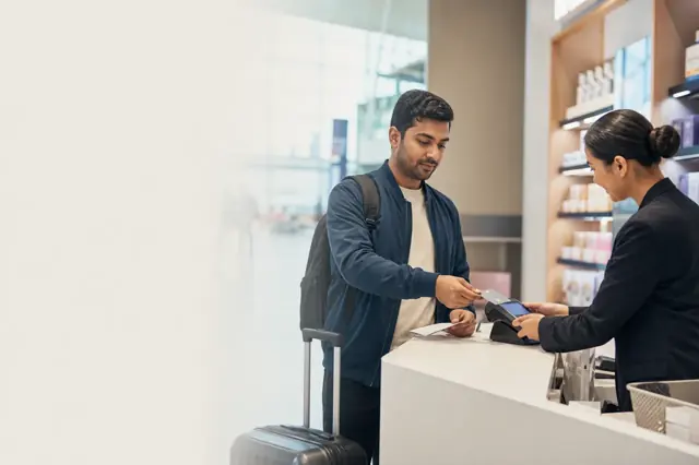 Indian consumer reviewing visa credit card features and monthly spending