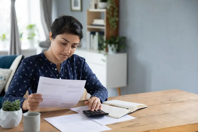Indian cardholder reviewing credit card interest and repayment options